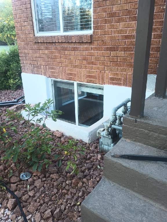 Second-story double-hung window with new screen mesh